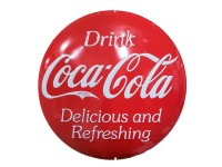 Enseigne Coca-Cola en métal ronde et bombé avec relief